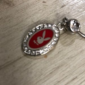 Playboy belly ring